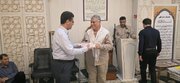 گرامیداشت هفته دفاع مقدس با تجلیل از ایثارگران و رزمندگان امدادگر در کمیته امداد بوشهر